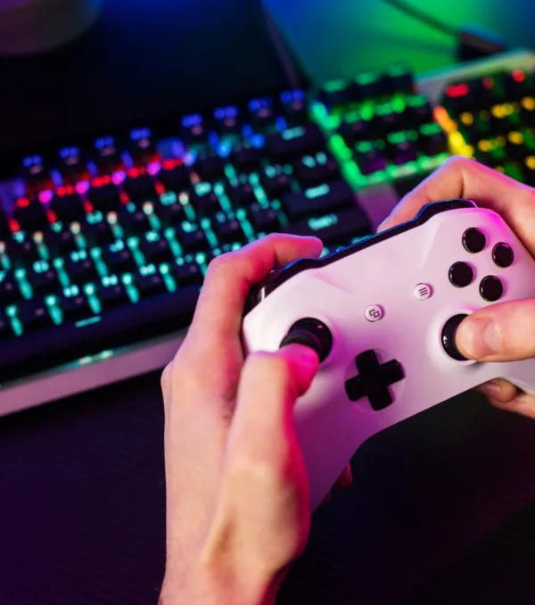 high-angle-hands-holding-controller